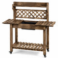 Gartenarbeitstisch 117 x 45 x 150 cm Holz Braun mit Pflanzwanne und Rollen